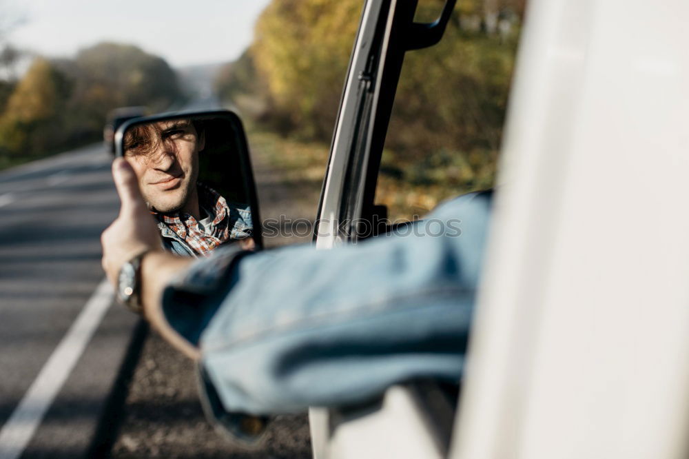 Similar – Man sleeping in vintage car