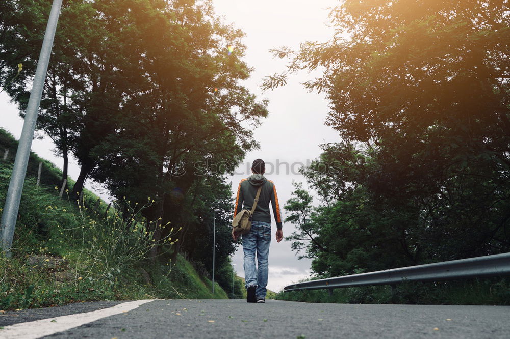 Image, Stock Photo Woman strolling on empty winter road