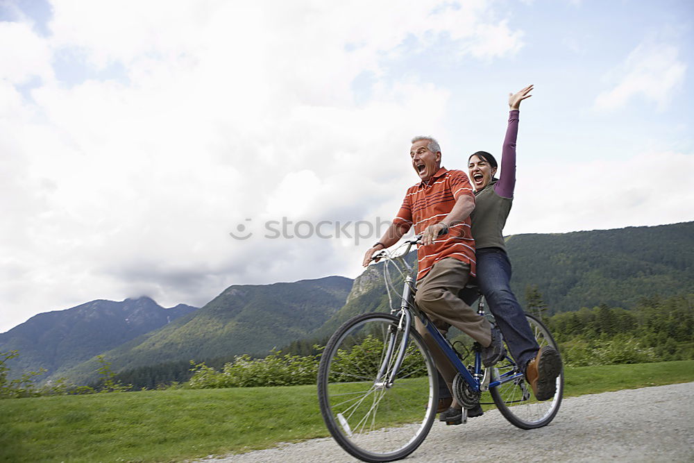 Similar – Image, Stock Photo Women on bikes giving high five