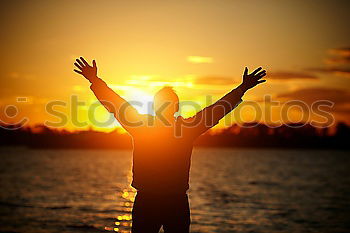 Similar – Image, Stock Photo Father and son playing at the sunset time.