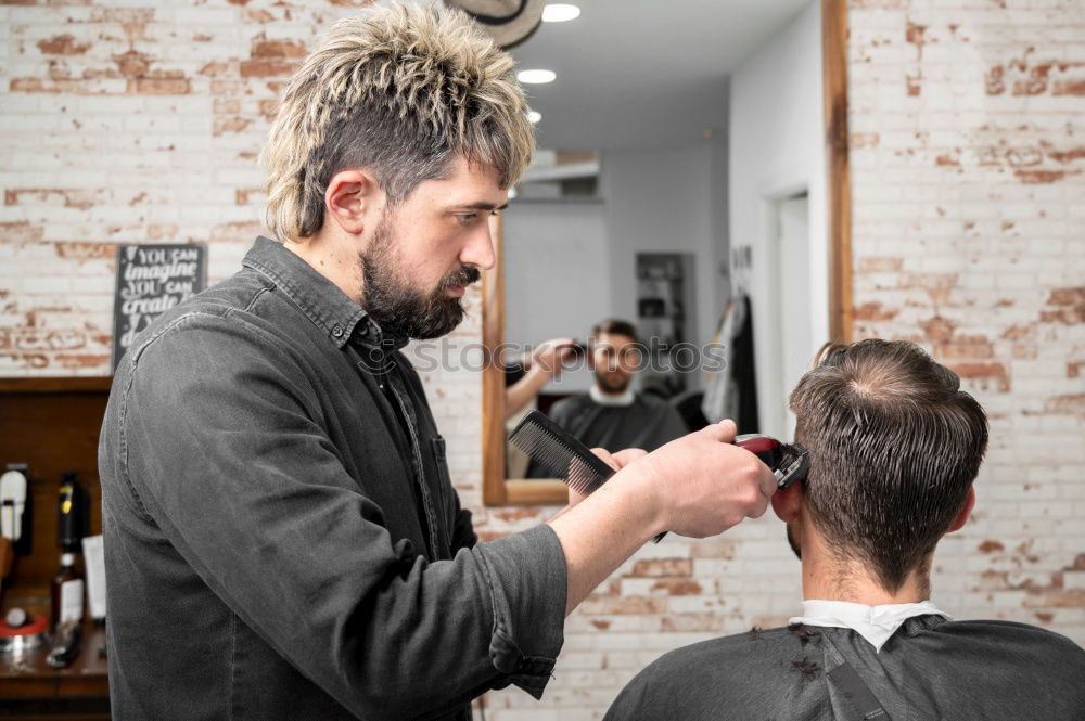 Similar – Barber doing face massage to man