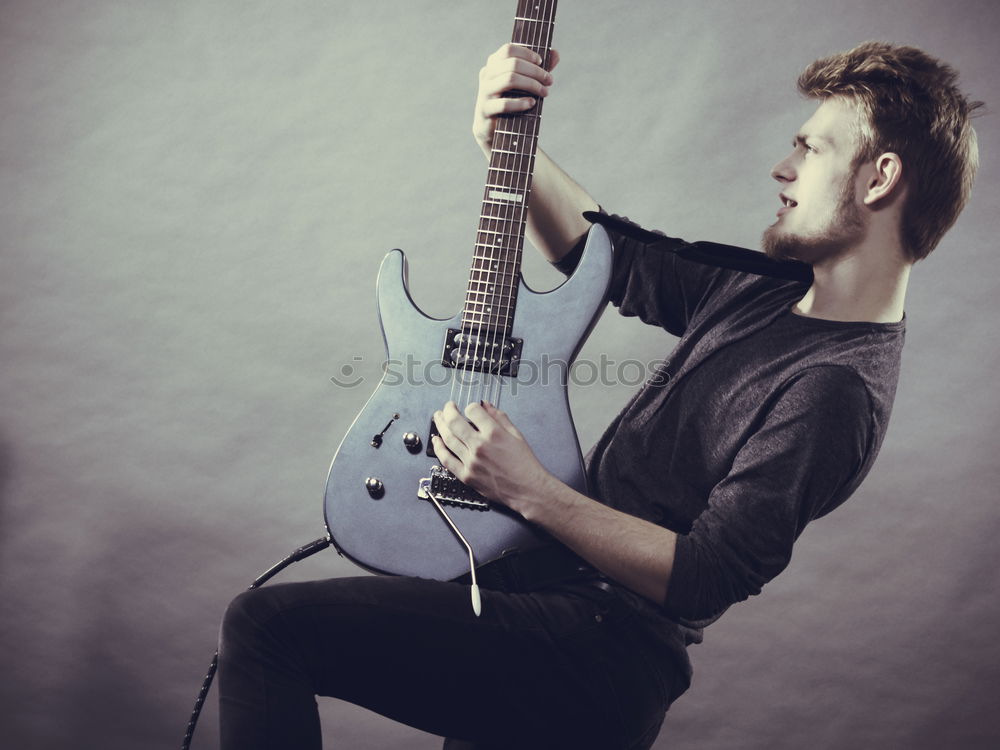 Similar – Image, Stock Photo outdoor photo session with a bass player and his instruments