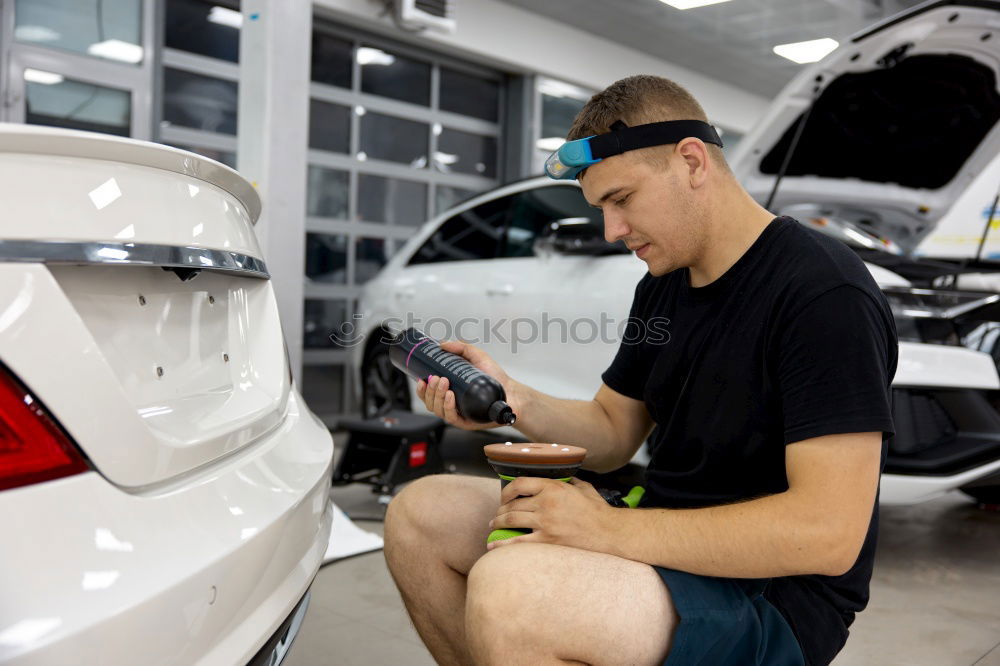 Similar – Image, Stock Photo Mechanic checking motorcycle