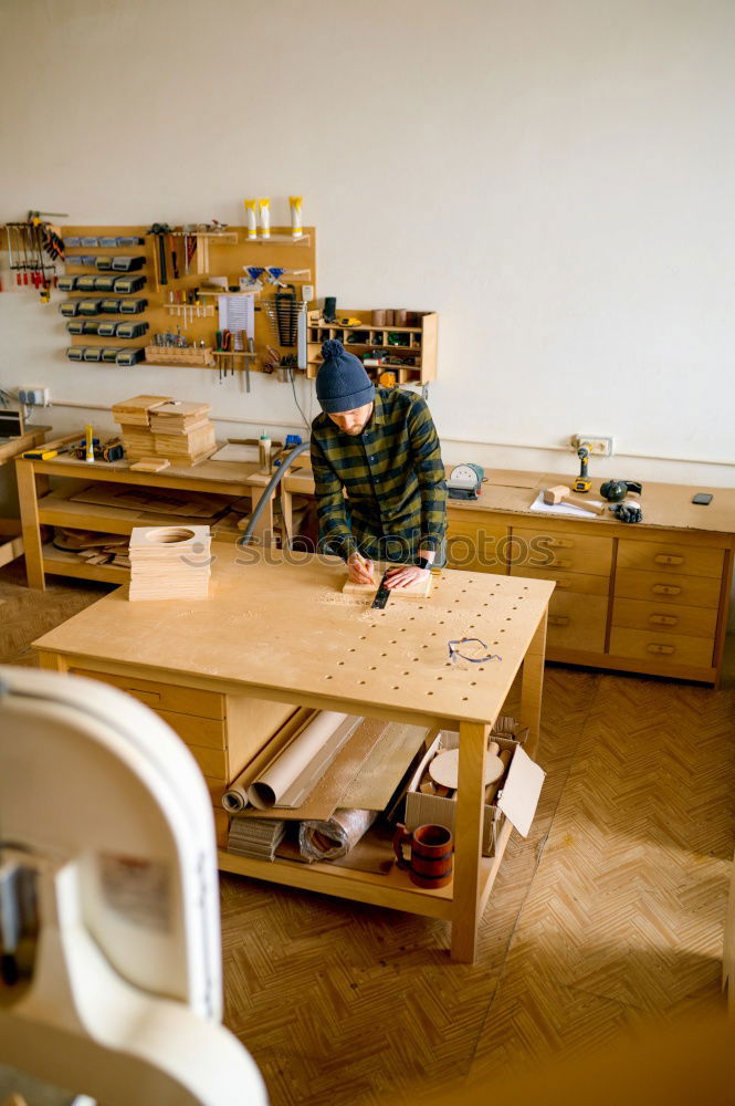 Similar – Image, Stock Photo Man doing woodwork in carpentry. Carpentry workshop