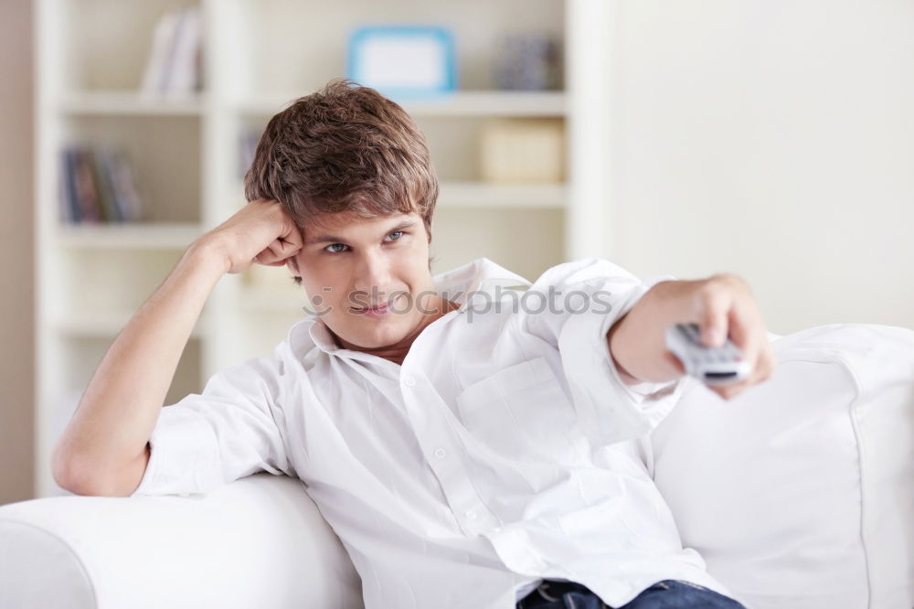 Similar – Image, Stock Photo Portrait of a young thoughtful mixed race man sitting in the sofa