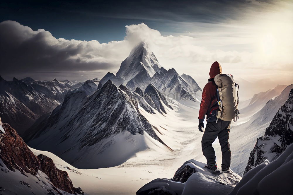 Similar – Tourist standing on stone in mountains