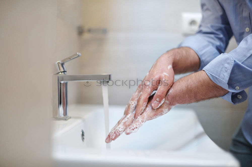 Similar – Image, Stock Photo Man rinsing his toothbrush under running water