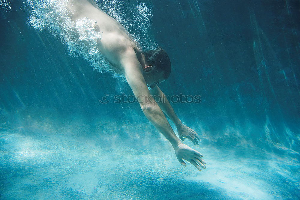 Similar – Image, Stock Photo Young woman diving in the sea