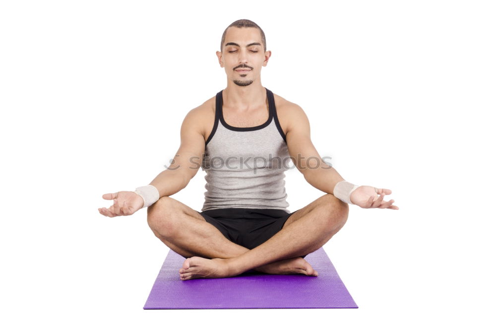 Similar – Anonymous man meditating during yoga training