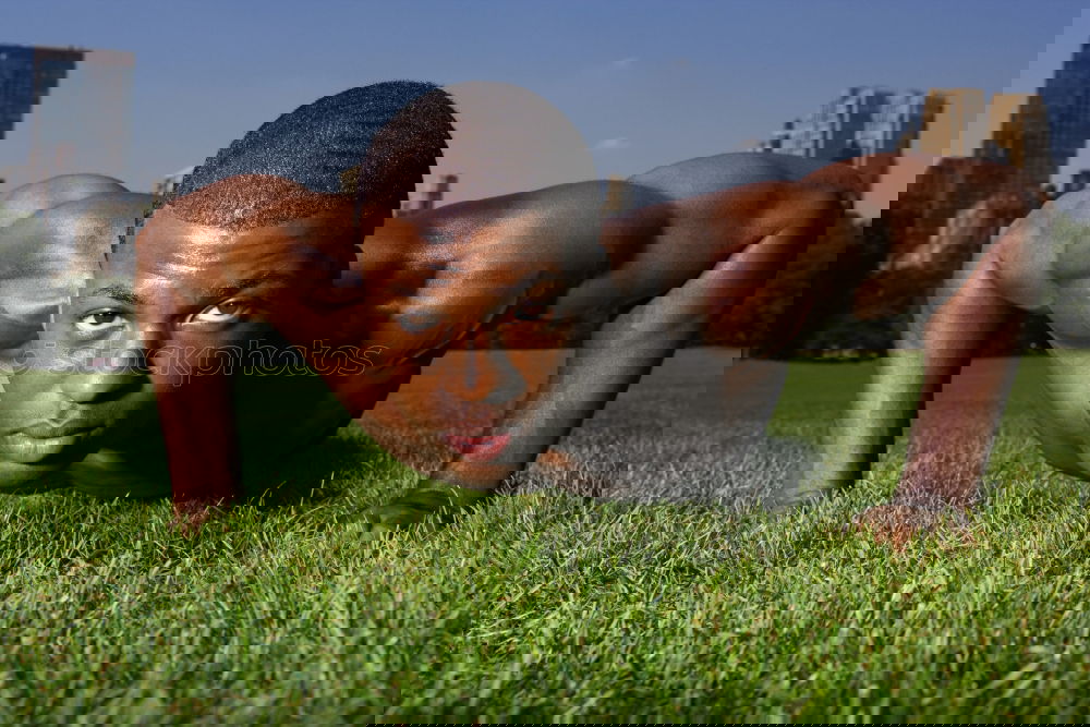 Similar – Image, Stock Photo Shirtless black man doing stretching in urban park.