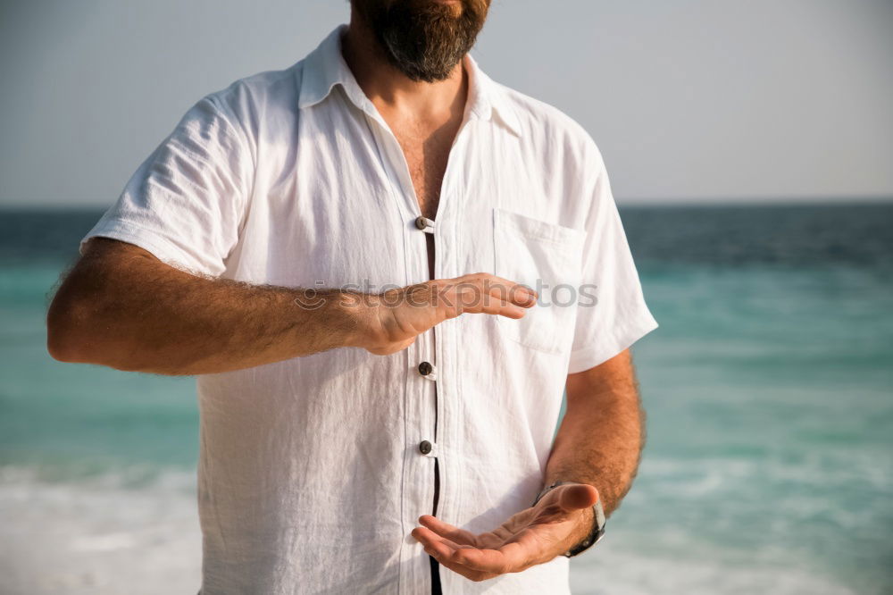 Similar – Young sports man is doing yoga for preparation of his workout