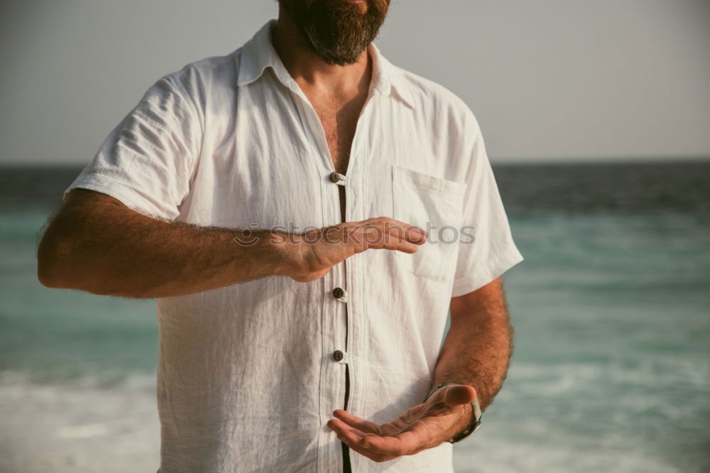 Similar – Cheerful bearded man with headphones