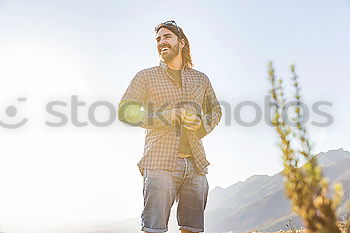 Similar – Tourist with camera on field