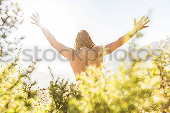 Similar – Image, Stock Photo Cheerful woman in garden