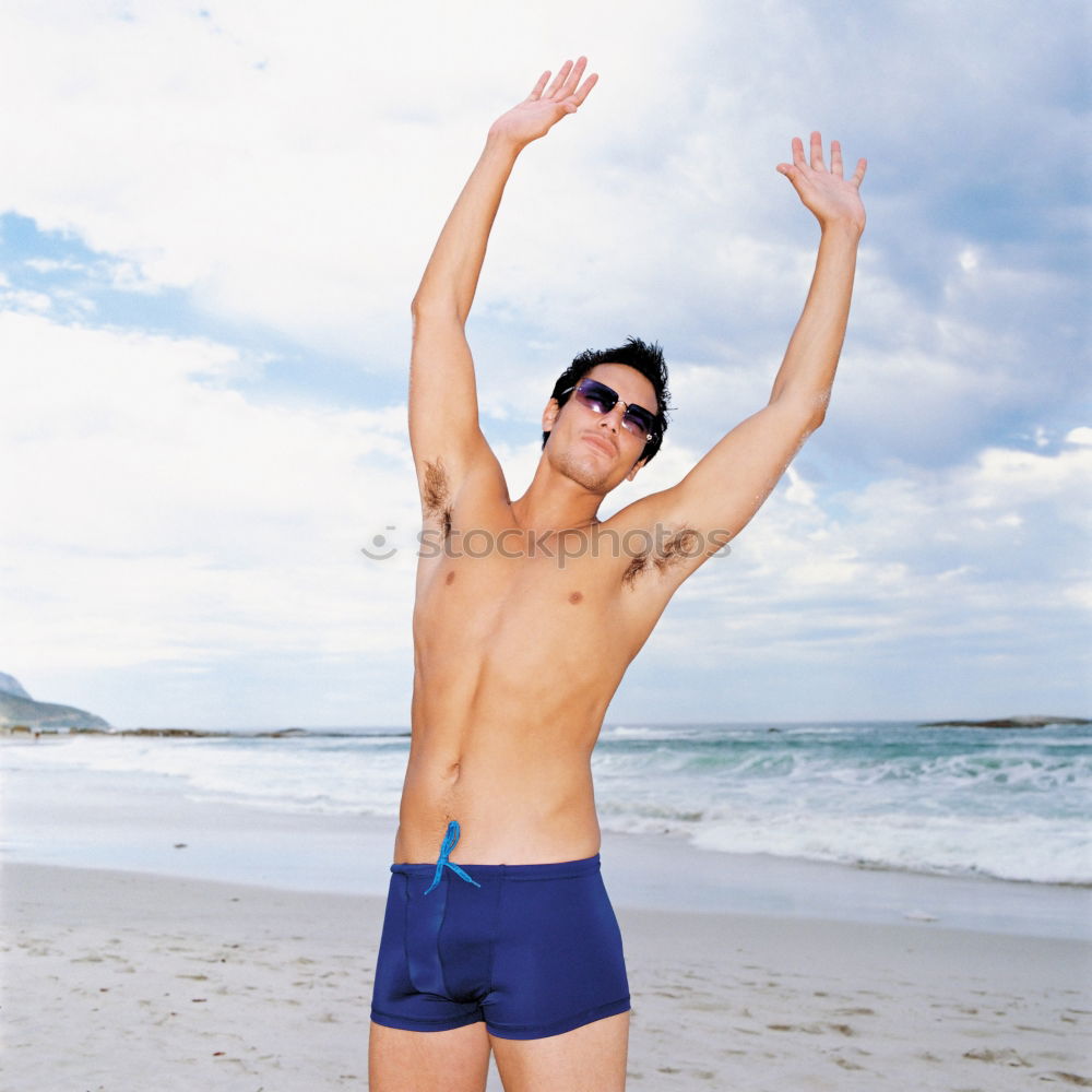 Similar – A man with a big belly in swimming trunks on the beach