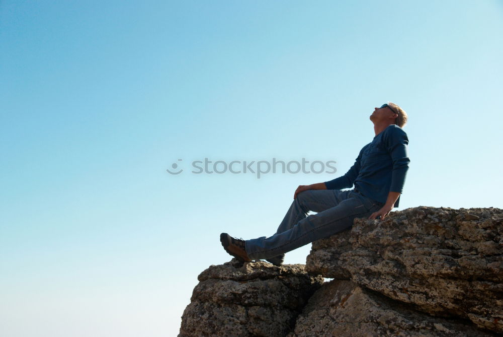 Similar – Image, Stock Photo Boy looking towards sunset from the old fortress