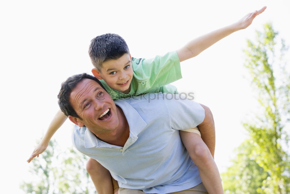 Similar – Image, Stock Photo Father and son playing on the beach