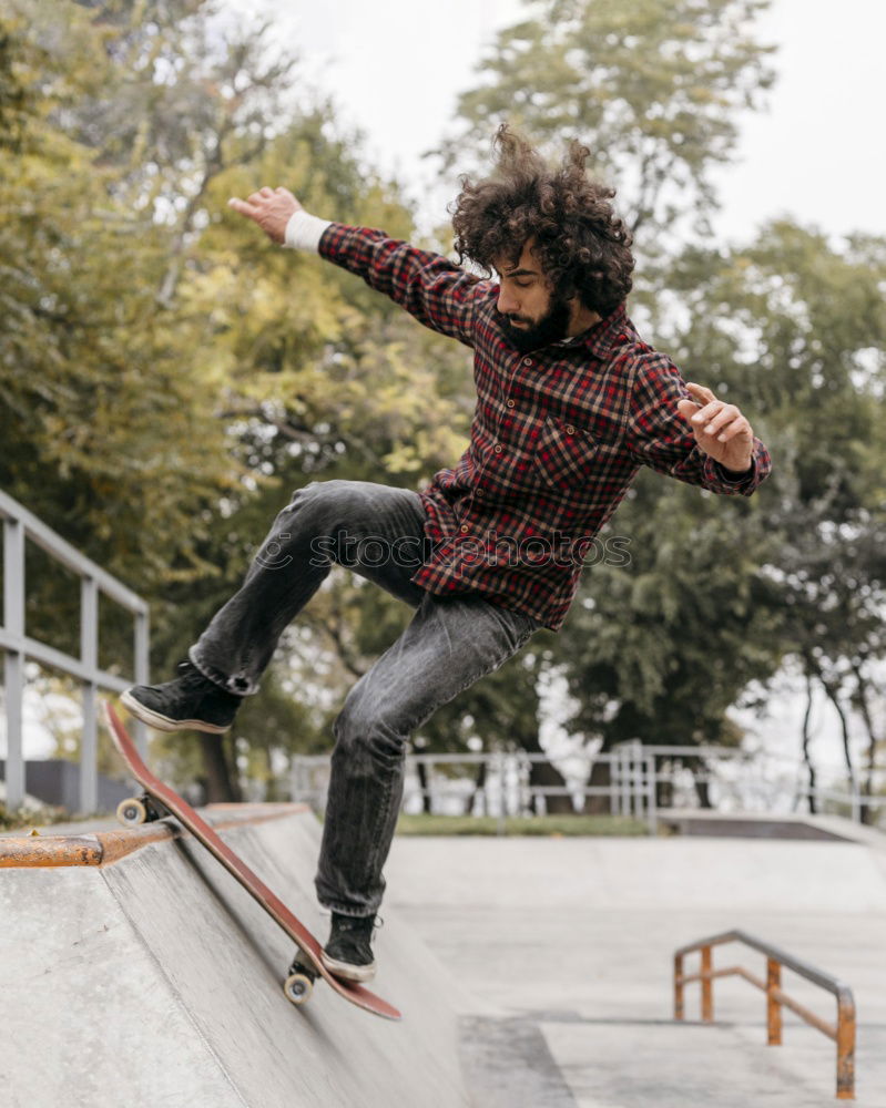 Similar – Young man jumping on street