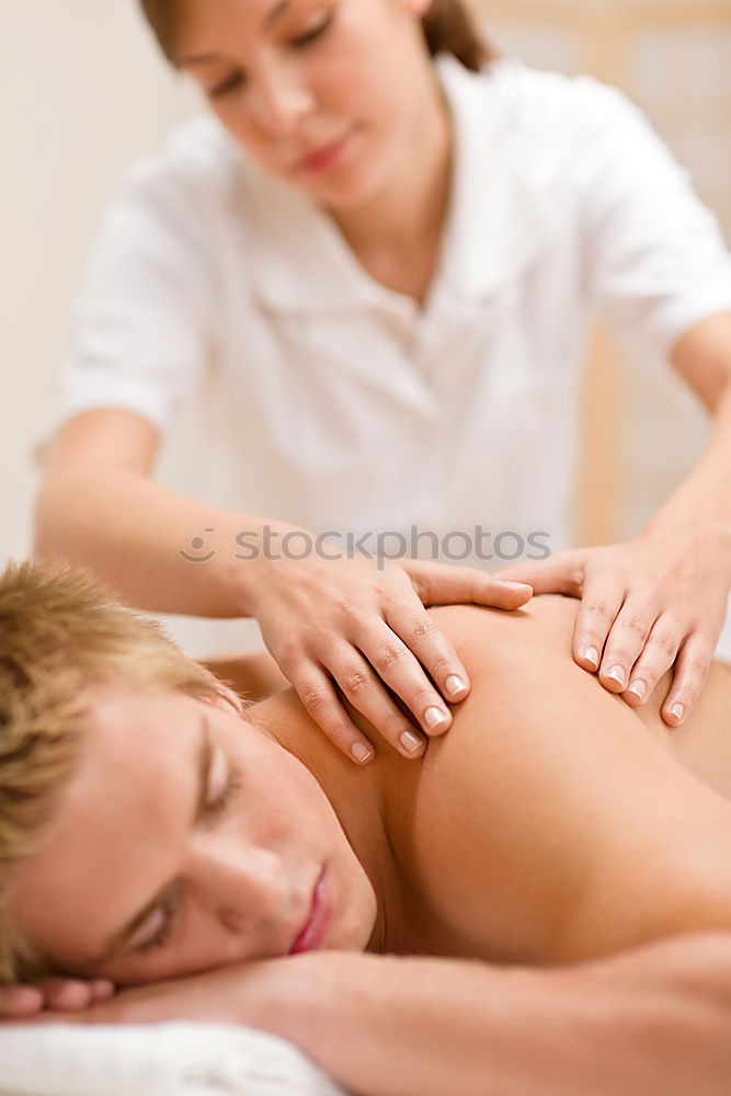 Similar – Young man having massage in spa