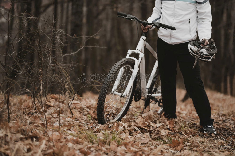 Similar – Image, Stock Photo Man walking with mountain biking