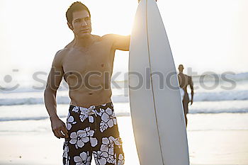 Similar – Tattooed man holding skateboard