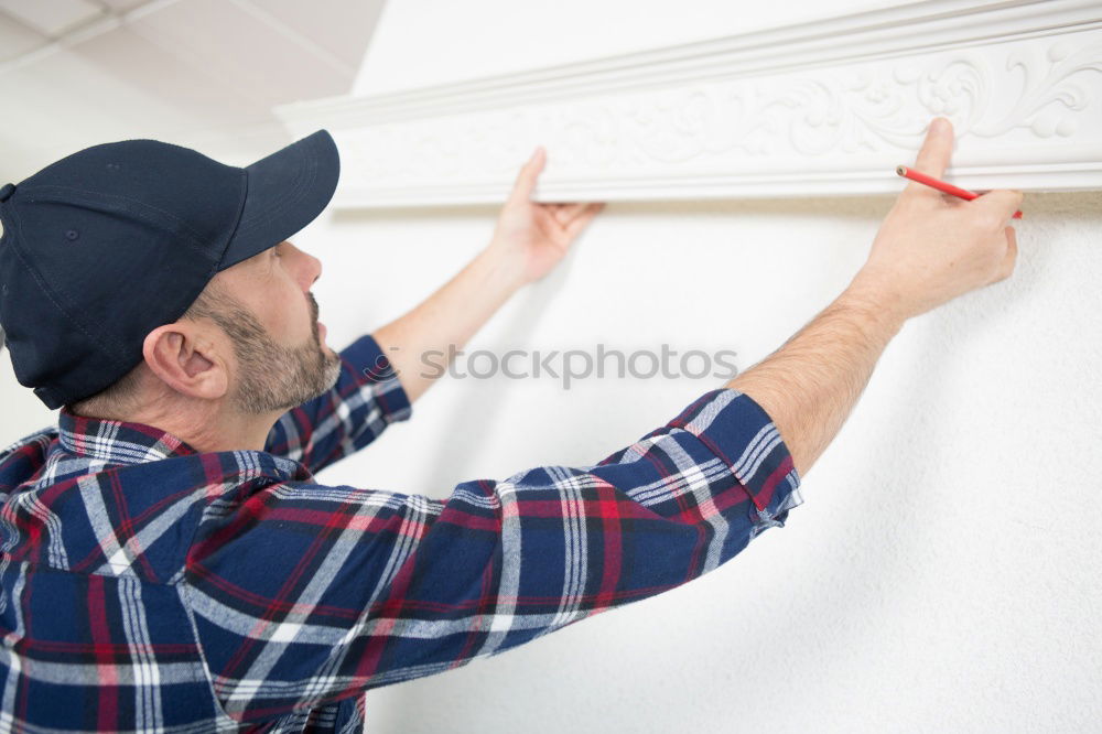 Similar – Image, Stock Photo Man painting a wardrobe