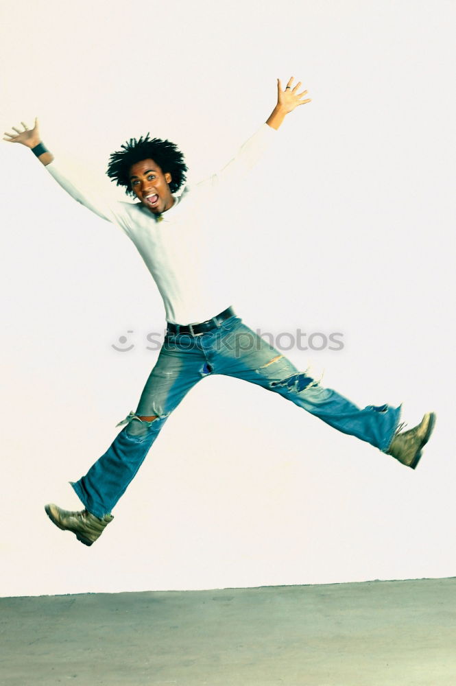 Similar – Woman with afro hair climbing by children’s attractions.