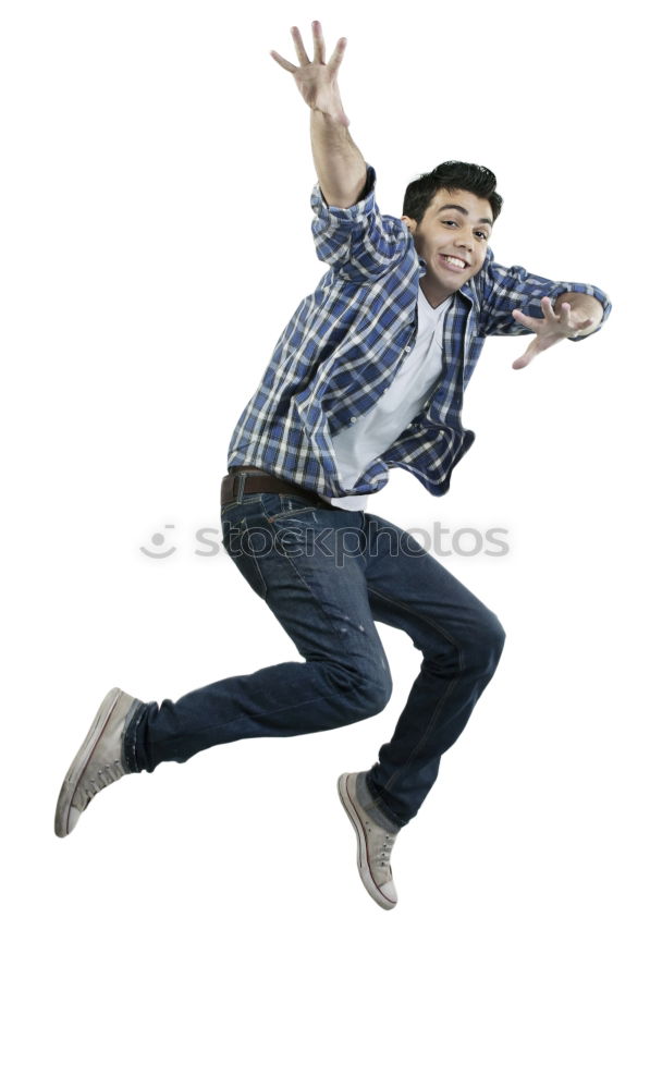 Similar – young man jumps into the air with three-coloured shadow