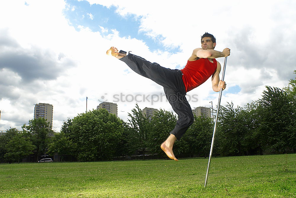 Similar – Image, Stock Photo Young rhythmic gymnast doing split jump during ribbon exercises.