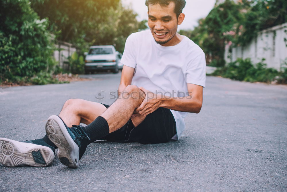 Similar – A long hair male running between the trees during a sunny day in the park with copy space