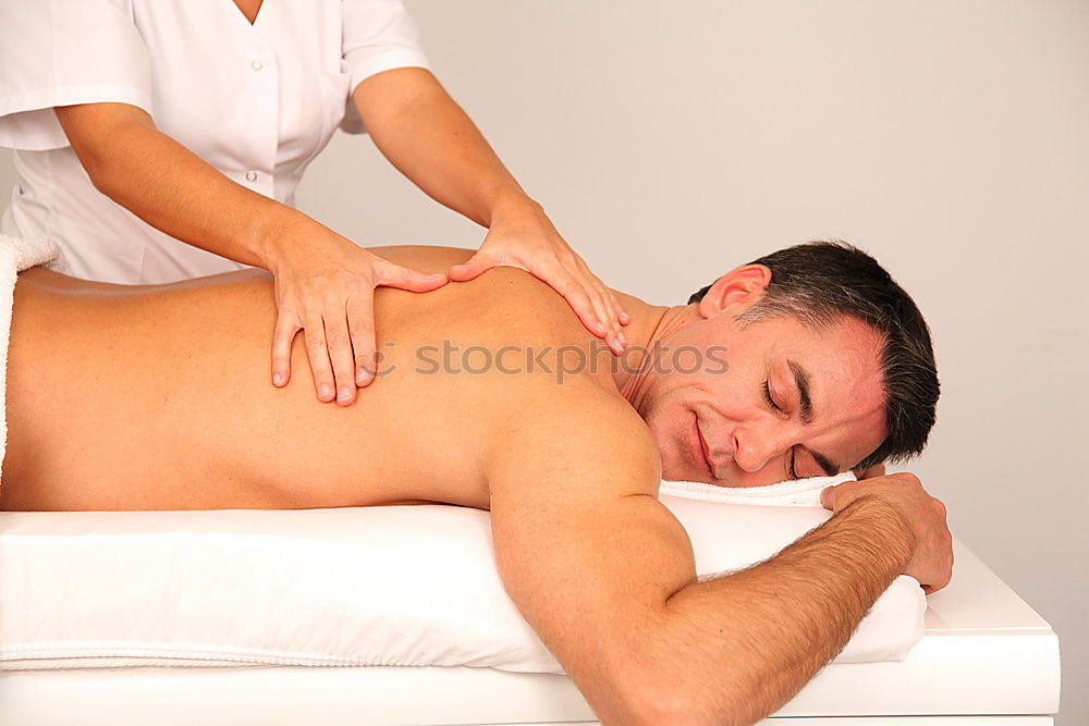 Similar – Young man having massage in spa