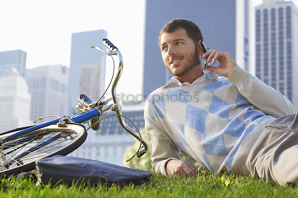 Similar – Image, Stock Photo Young man with mobile phone and fixed gear bicycle