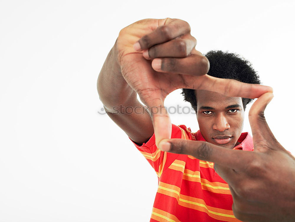 Similar – Young man holding headphones