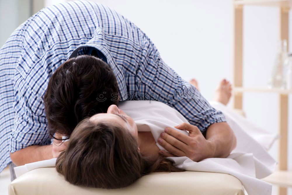 Similar – Image, Stock Photo Happy man listening and touching his pregnant wife tummy on the sofa at home