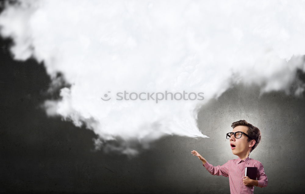 Similar – Young man eating a cotton candy in a fair