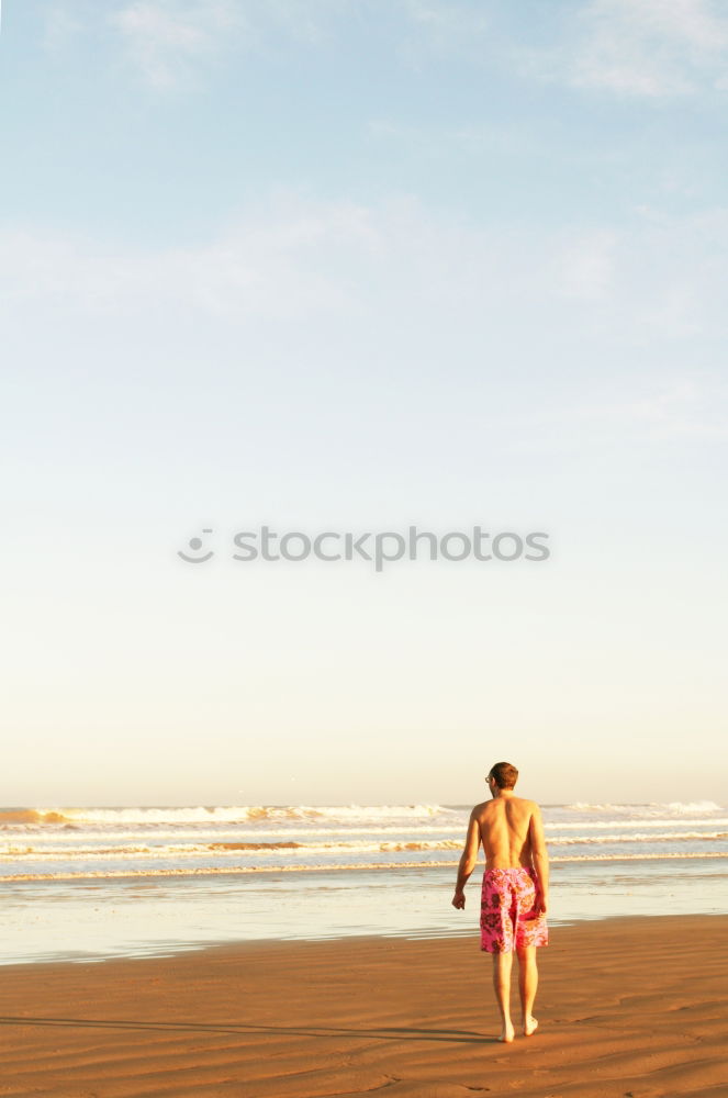 Similar – Young woman sitting alone on the beach and has wanderlust