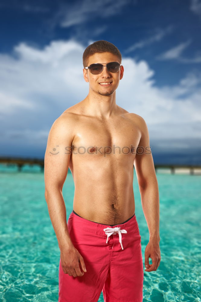 Similar – Young attractive surfer holding his surfboard at the beach