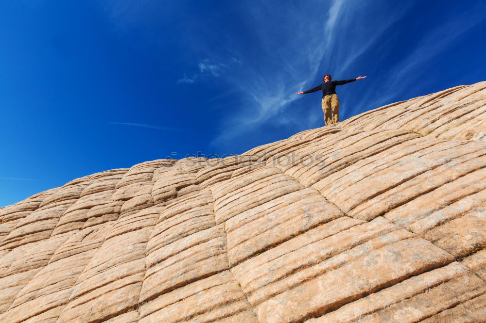 Similar – Rock climber falling upside down.