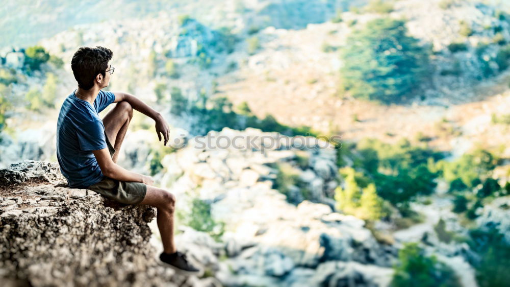 Similar – Image, Stock Photo Young tourist with backpack looks through a binoculars