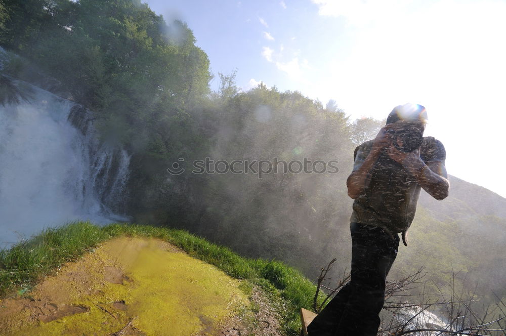 Similar – Image, Stock Photo Couple doing trekking looking with binoculars