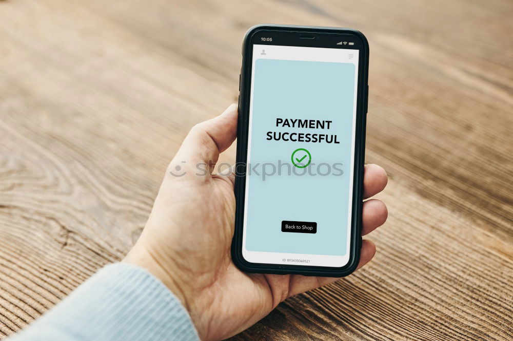 Similar – Image, Stock Photo Man paying with smartphone for online shopping. Paying using fast secure payment system. Paying bills using express payment technology. Ordering product online using smartphone. Confirmation payment successful displayed in store app