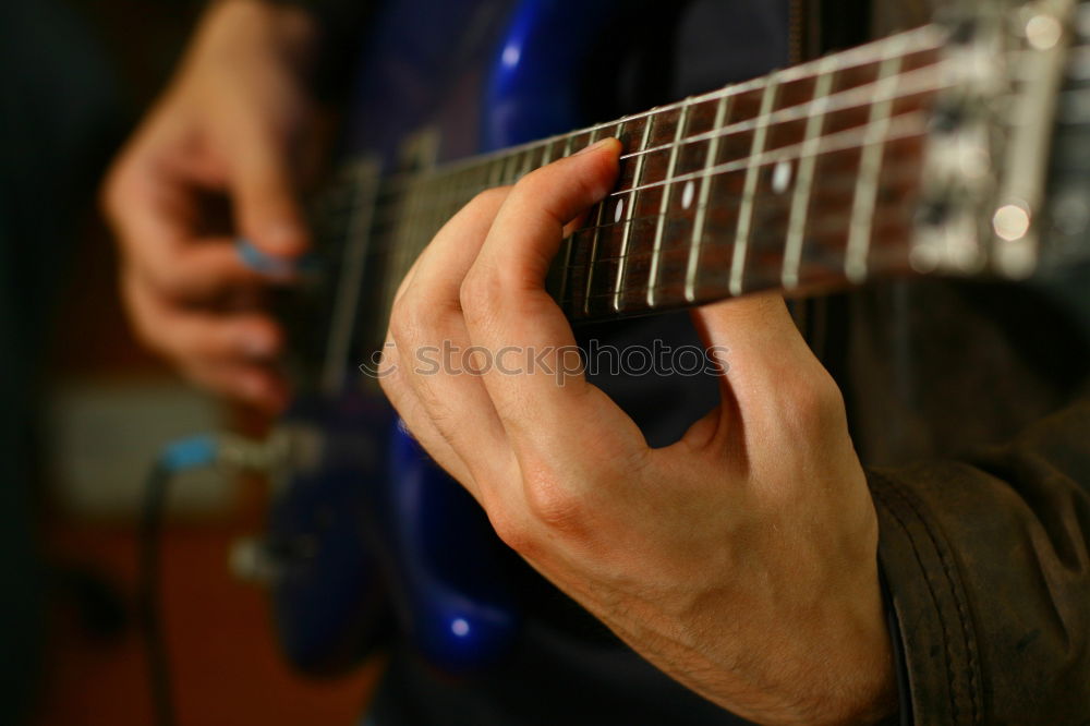 Similar – guitar playing Make music