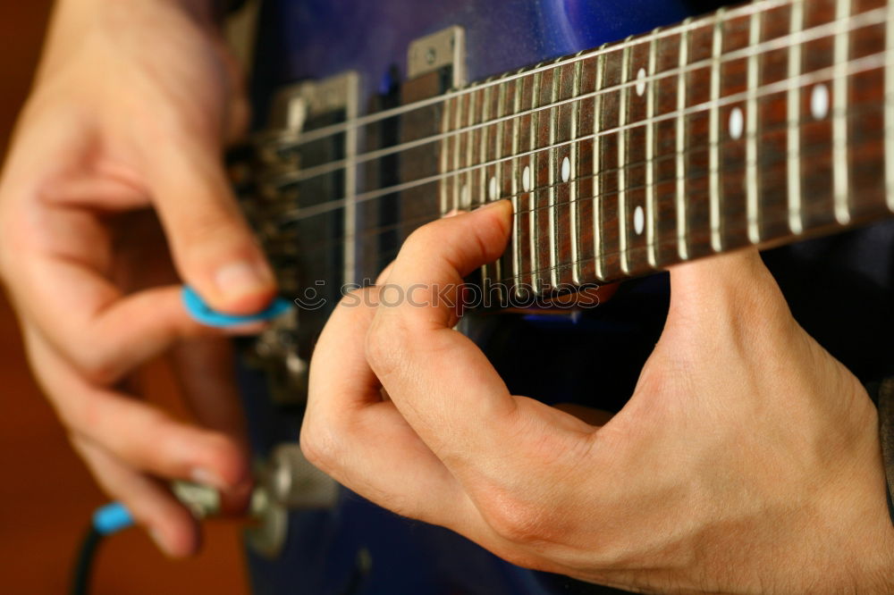 Man playing electric guitar