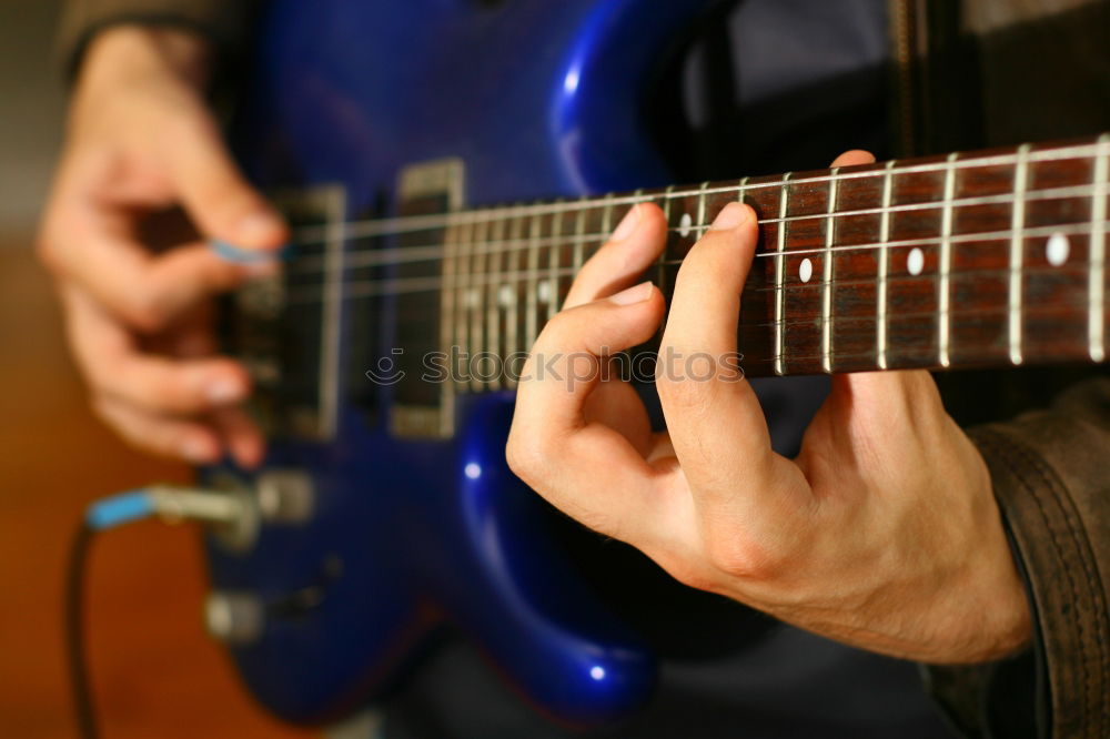 Similar – Man playing electric guitar