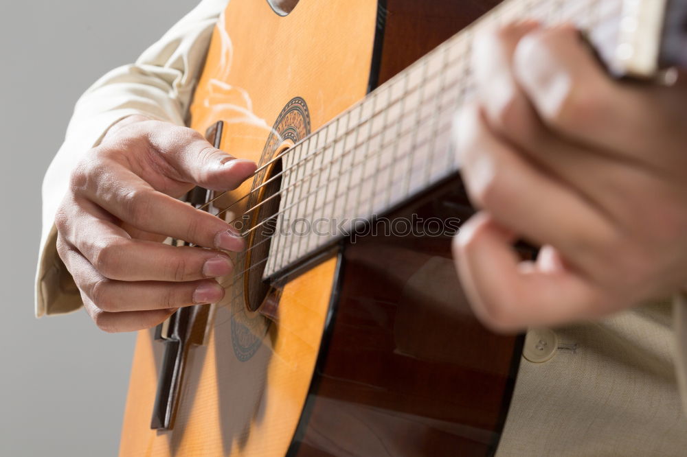 Similar – Man playing electric guitar