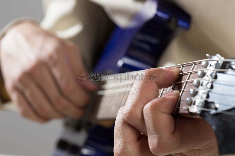 Similar – Man playing electric guitar