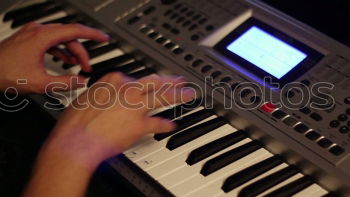 Similar – Image, Stock Photo Overhead view of pianist playing piano at home