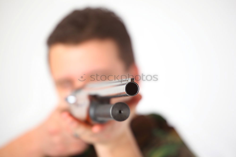 Similar – Image, Stock Photo Young photographer playing with accessories for professional camera like with rifle while lying on floor