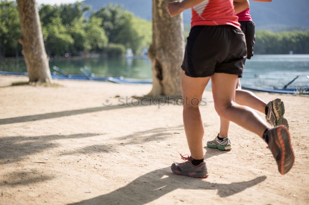 Similar – Senior runner man jumping arms up after running