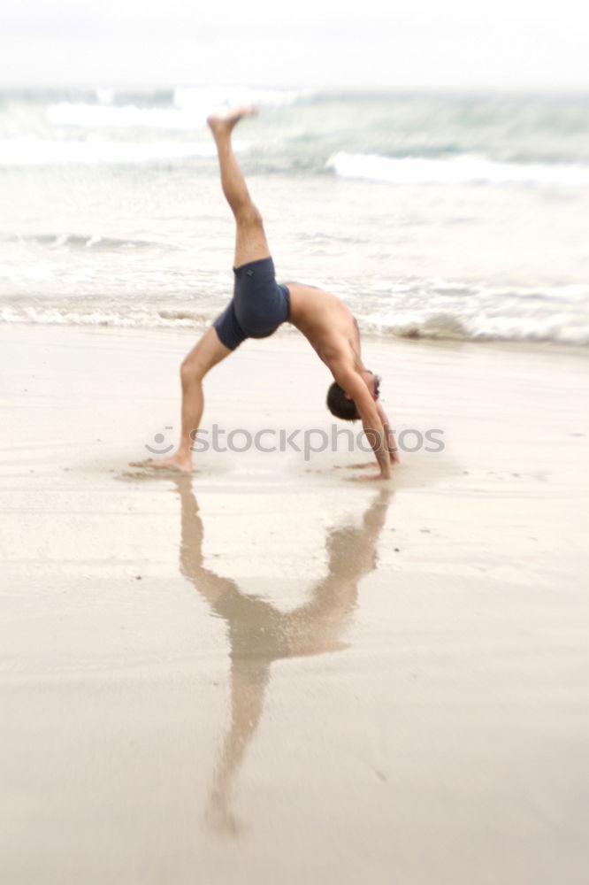 Similar – Image, Stock Photo Young women doing yoga pose on beach in the morning